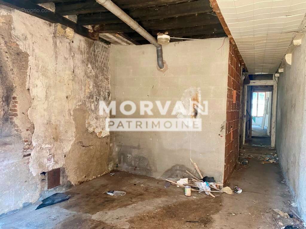 Coeur nivernais - maison sur trois niveaux a restaurer - photo 12