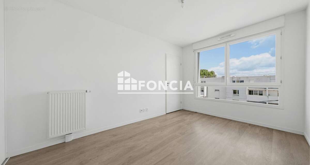 Appartement T3 de 60 m² - Terrasse et Parking - photo 4