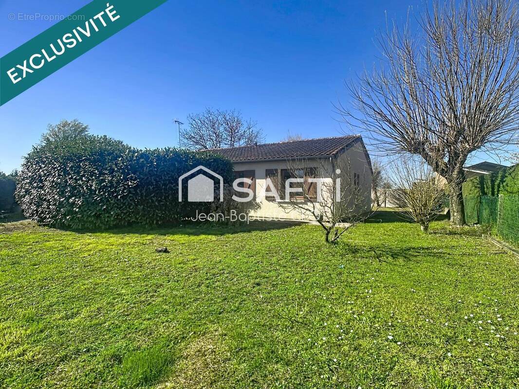 Photo 1 - Maison à CADILLAC