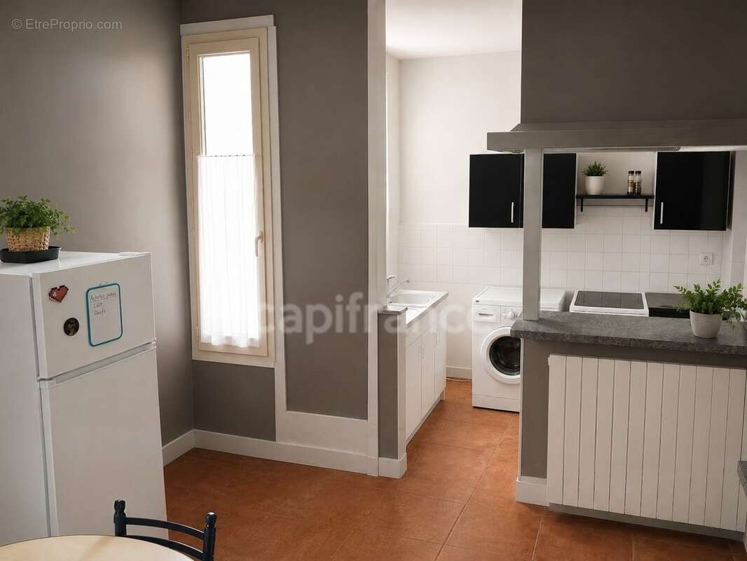 Tonnerre centre-ville – immeuble de caractère avec habitation + local commercial de 40m2 - photo 6