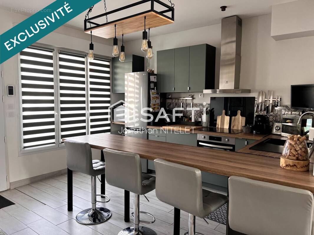 Photo 1 - Maison à RANG-DU-FLIERS