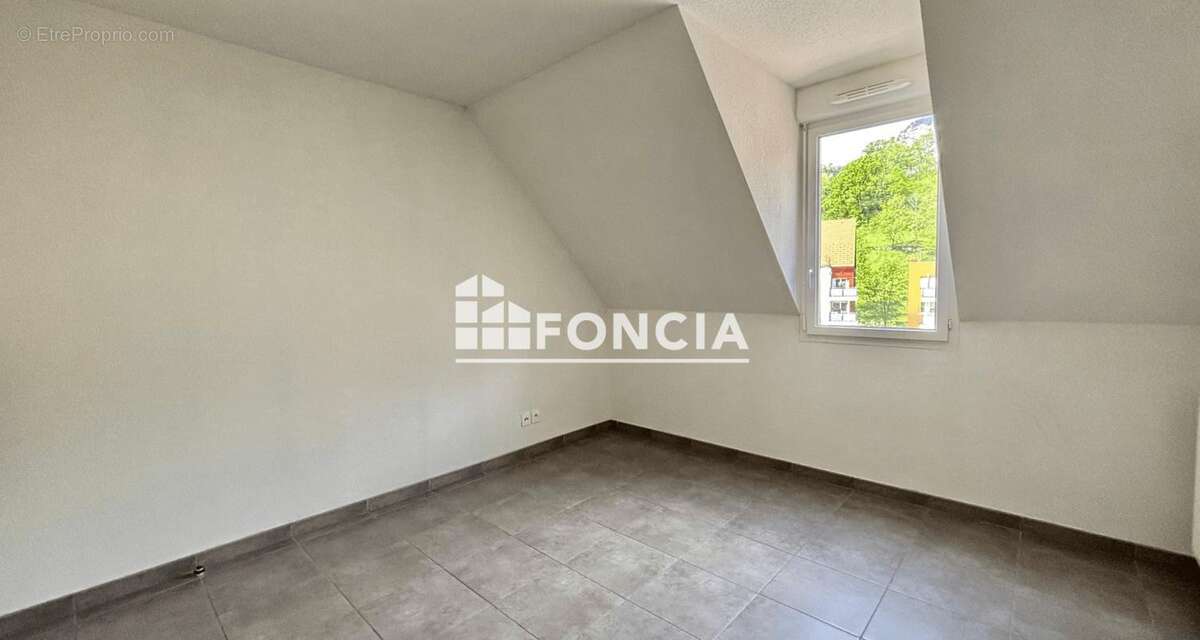 Appartement 3 pièces en dernier étage - photo 10