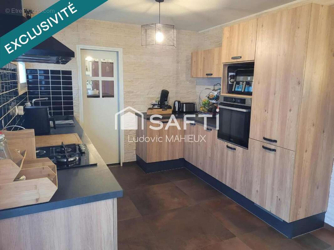 Photo 6 - Maison à SAINT-JACUT-LES-PINS