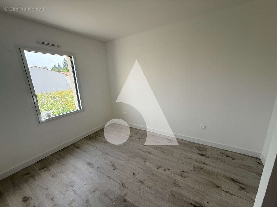 Maison plain pied 85m2 de 3 chambres à Coulon - photo 6