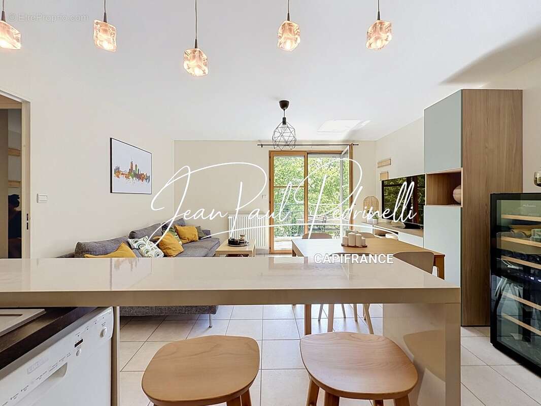 Tassin-la-Demi-Lune - Appartement 2 pièces de 48 m² avec balcon, parking privatif et cave - résidence sécurisée récente - photo 14
