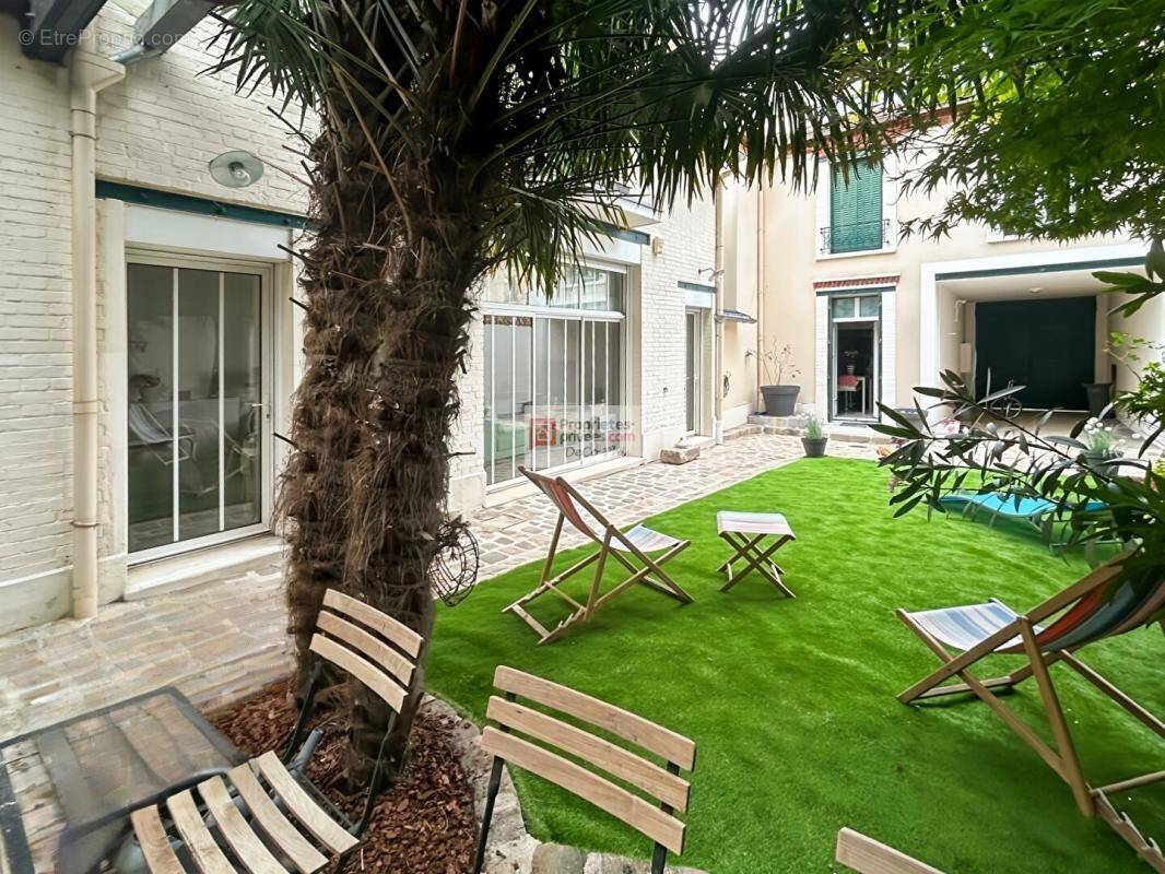 Suresnes centre-ville bas  grande maison d'exception - photo 1