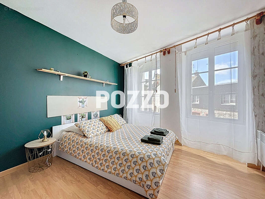 Maison 6 pièces à Genêts : 3 logements communicants avec beau potentiel locatif - photo 12