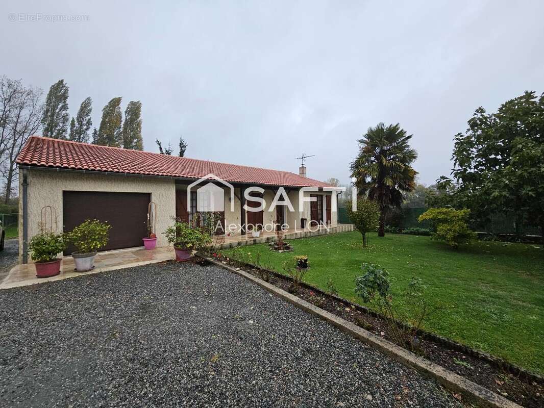 Photo 2 - Maison à SAINT-MARTIN-DE-BERNEGOUE