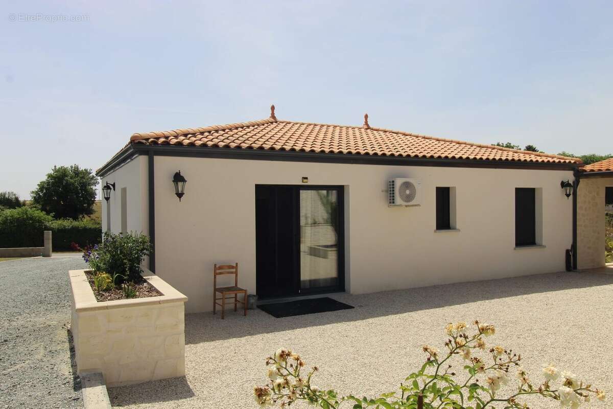 Maison 122 m² à Migre  - photo 3