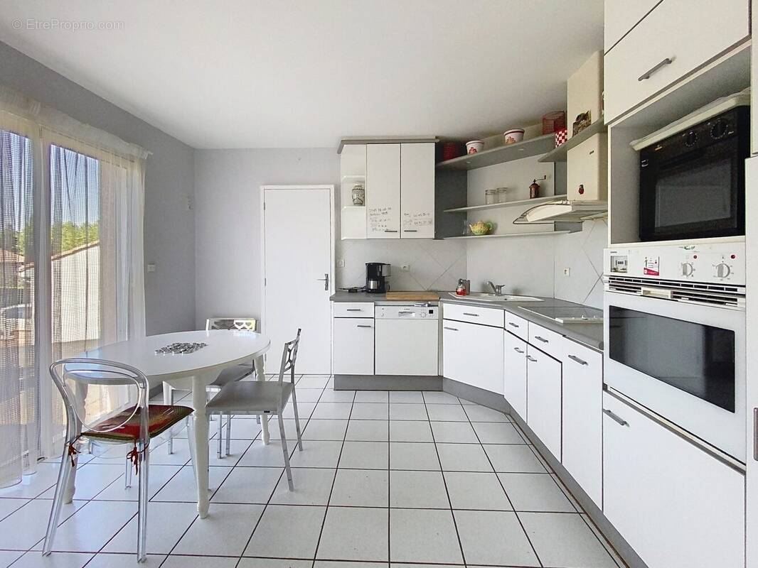 Maison 128 m² à Puygouzon  - photo 6