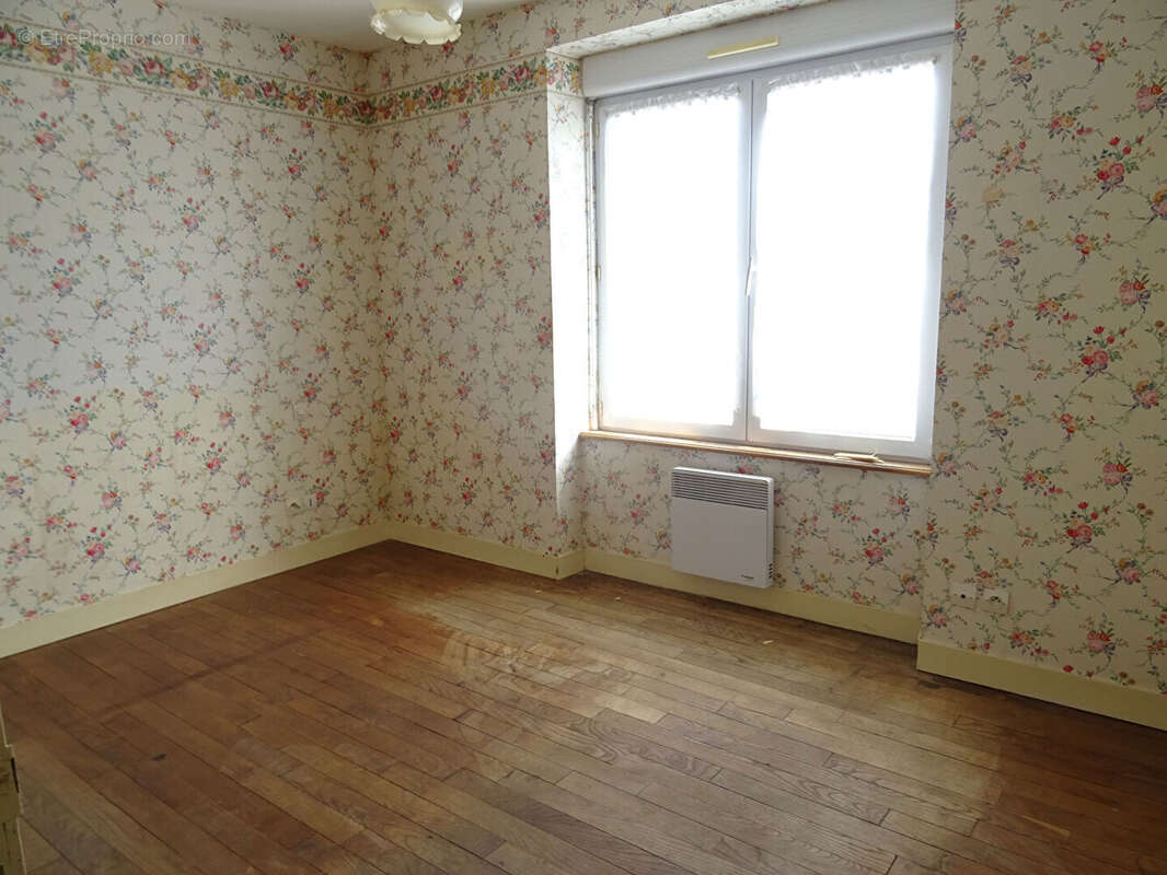 Maison à JUVIGNY-LE-TERTRE