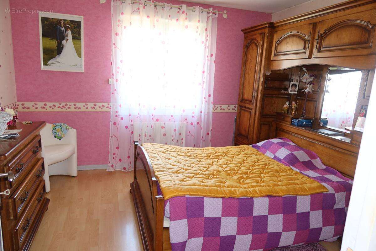 Maison à POUILLEY-LES-VIGNES