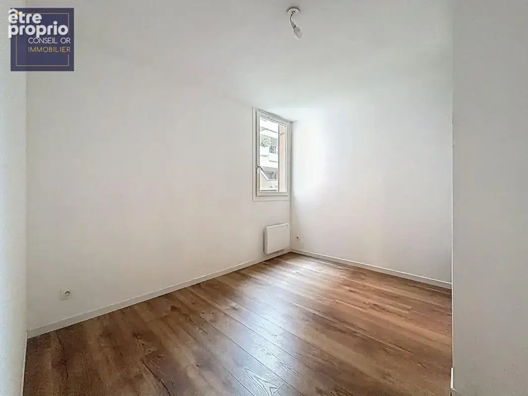 T4 - 82,5 m2 - 3 chambres - Balcon - Parking sous sol - cave - photo 10