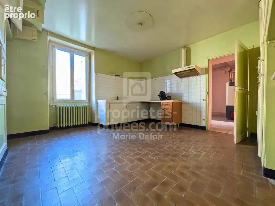 Maison de 11 pièces avec potentiel locatif - photo 3