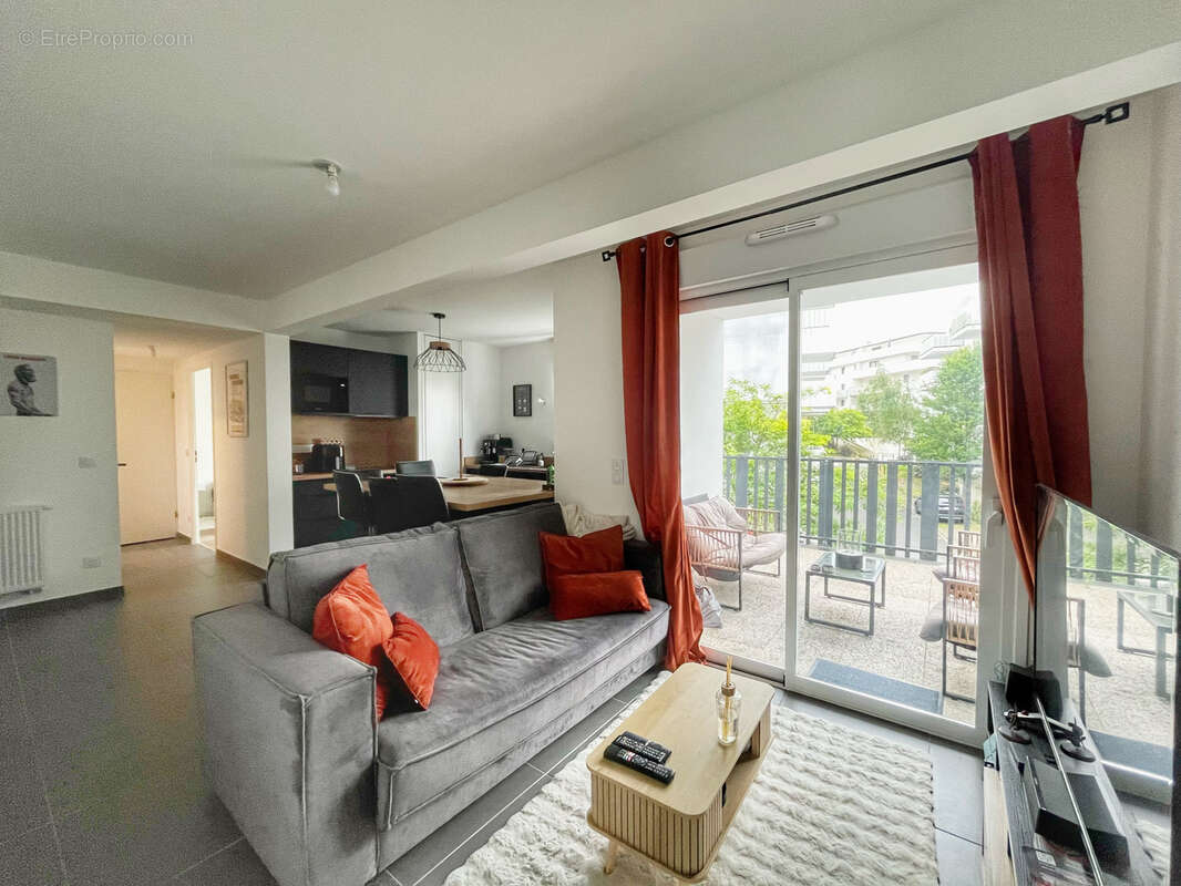 Appartement T2 avec terrasse et place de parking - photo 3