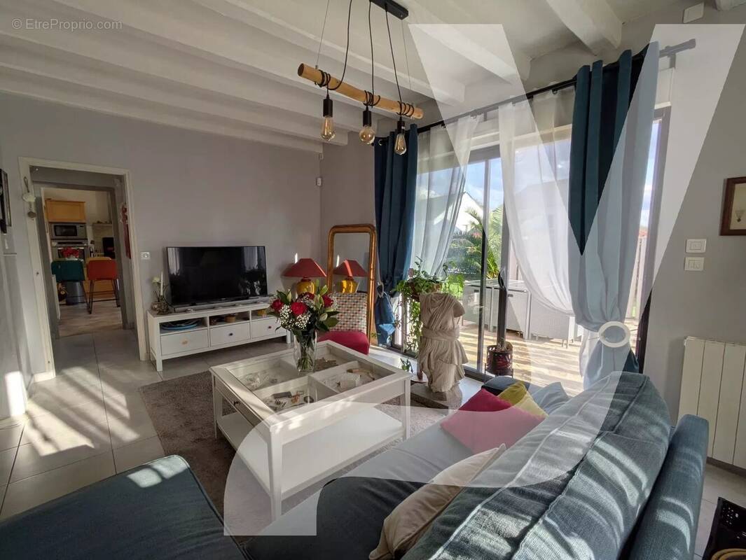 Maison à TREILLIERES