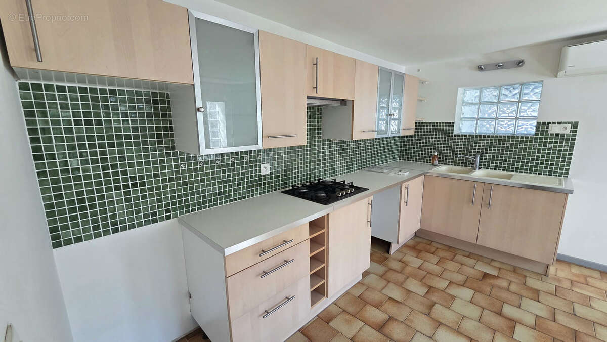 Appartement rdc t2 56m2 carrez + terrasse + parking exterieur - photo 7