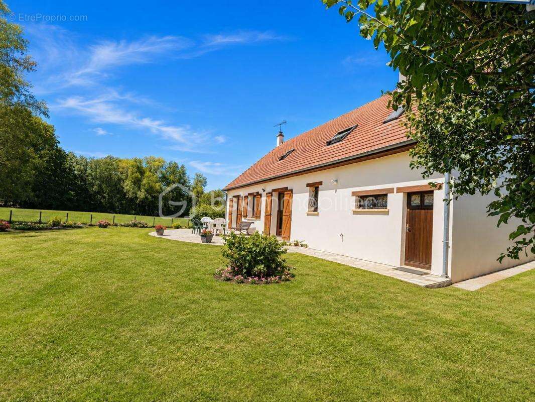 Maison 6 pièces – 143 m² – 4 chambres – Parc paysager de 1 700 m² - photo 22