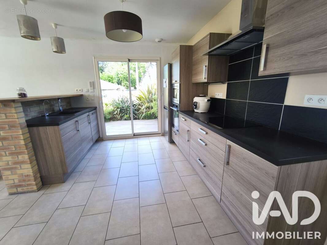 Maison 106 m² à Bourg-Achard  - photo 3