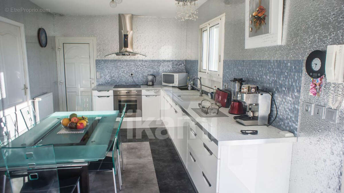 Maison à GENISSIEUX