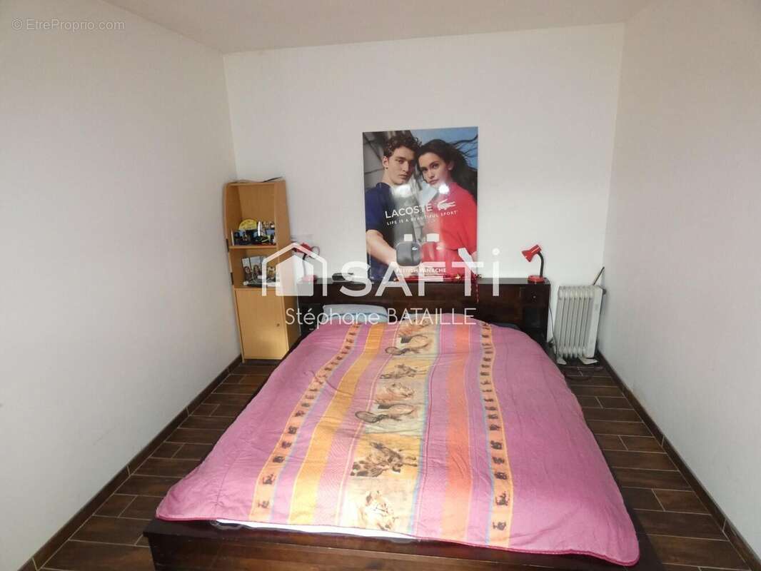 Maison 136 m² à Angliers  - photo 7