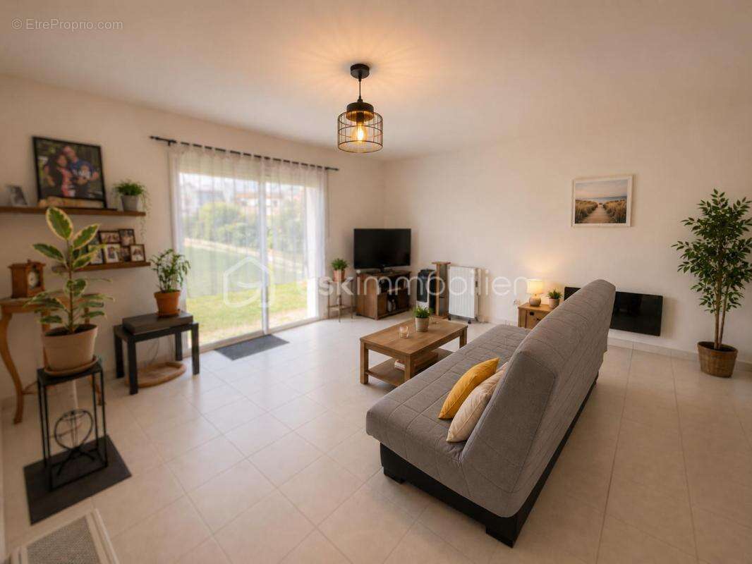 Maison de plain-pied 79 m² – 2 chambres – Jardin – Vendue louée – Arces-sur-Gironde - photo 4