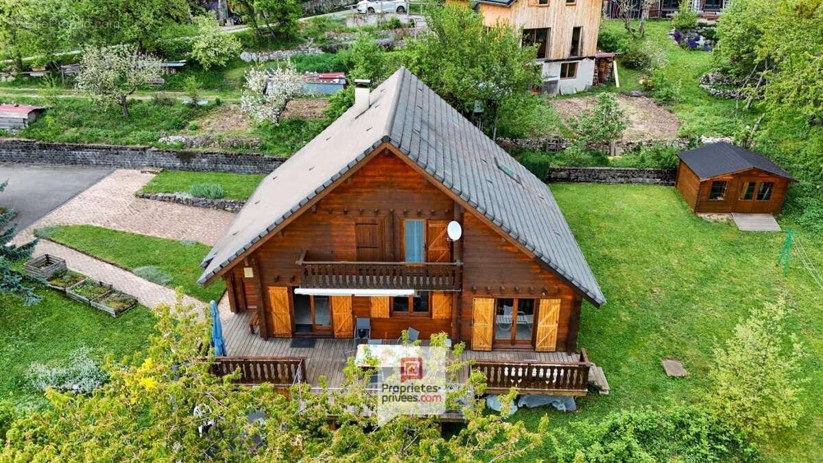 Plateau des Petites Roches (38660) - Chalet T6 en madriers + studio + carport + jardin - photo 18