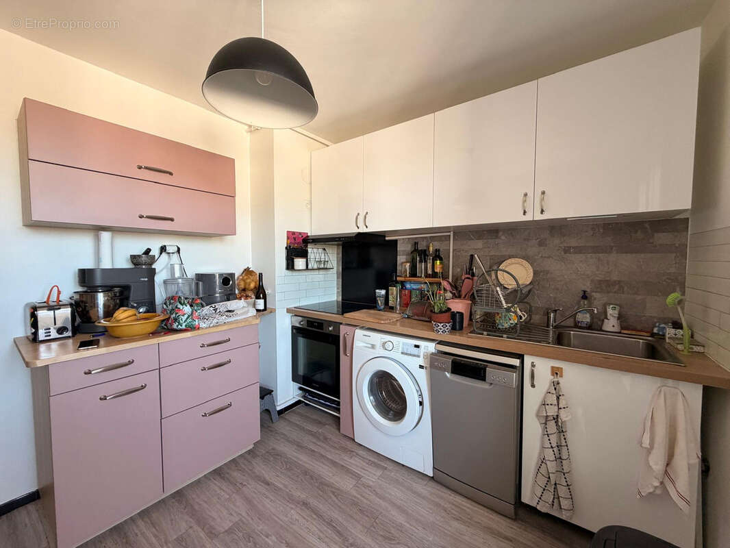 NIMES TRIANGLE DE LA GARE/ PARC JACQUES CHIRAC Appartement P3 BIS de 65m2 avec balcon, cave, place de parking - photo 4