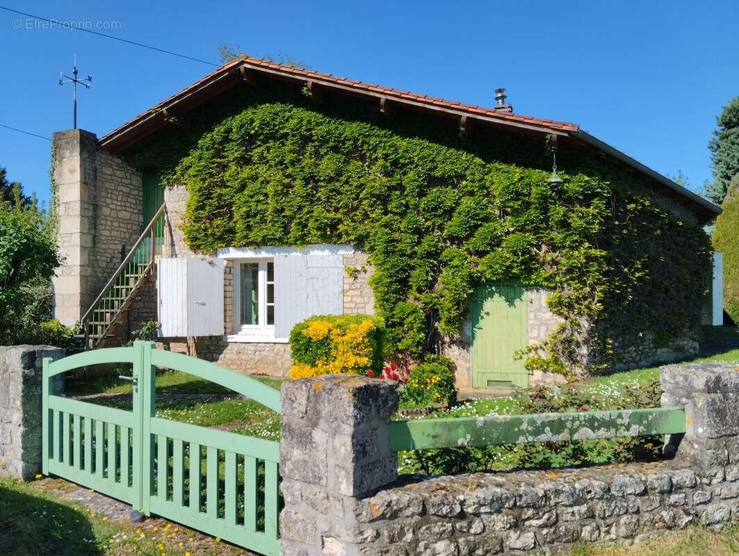 Maison à AUBIGNE