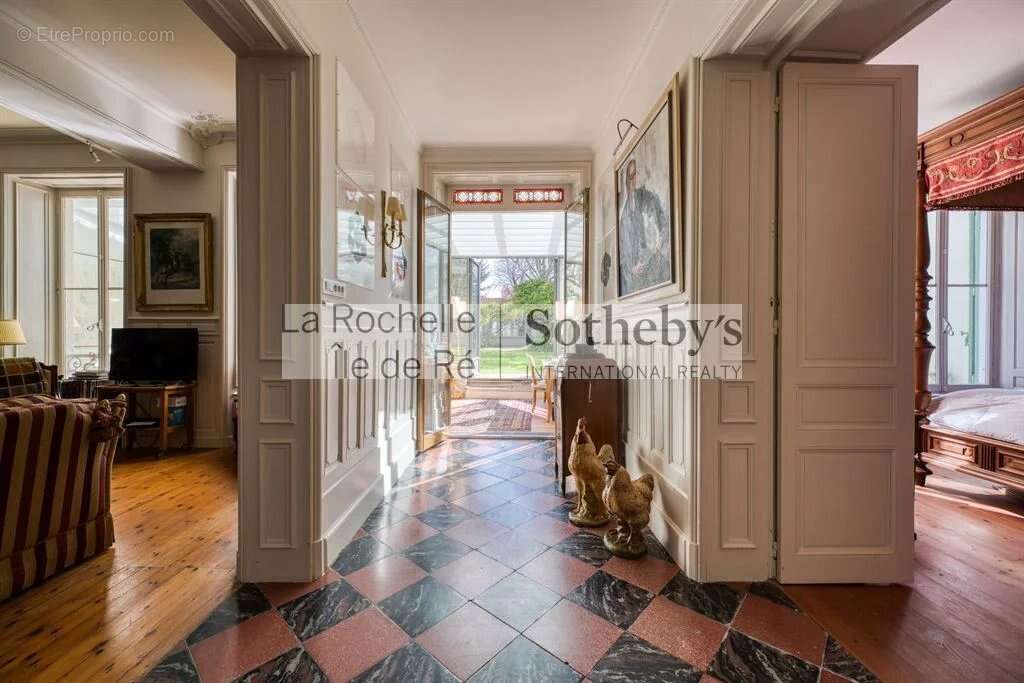Elégant Appartement de Charme avec Jardin - photo 5