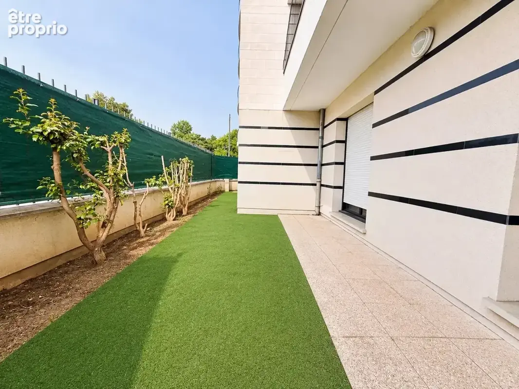 Appartement F3 de 62 m² avec jardin privatif et place de parking sécurisée - photo 8