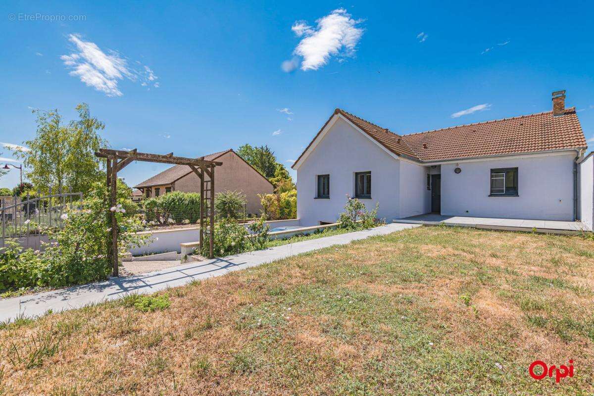 Maison de Plain Pied à Vendre avec Jardin, terrasse et Garage en sous-sol - photo 9