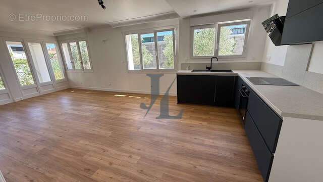 EXCLUSIVITÉ   Bien rare ! Appartement T3 en rez-de-jardin avec terrasse couverte et jardin privatif - photo 2