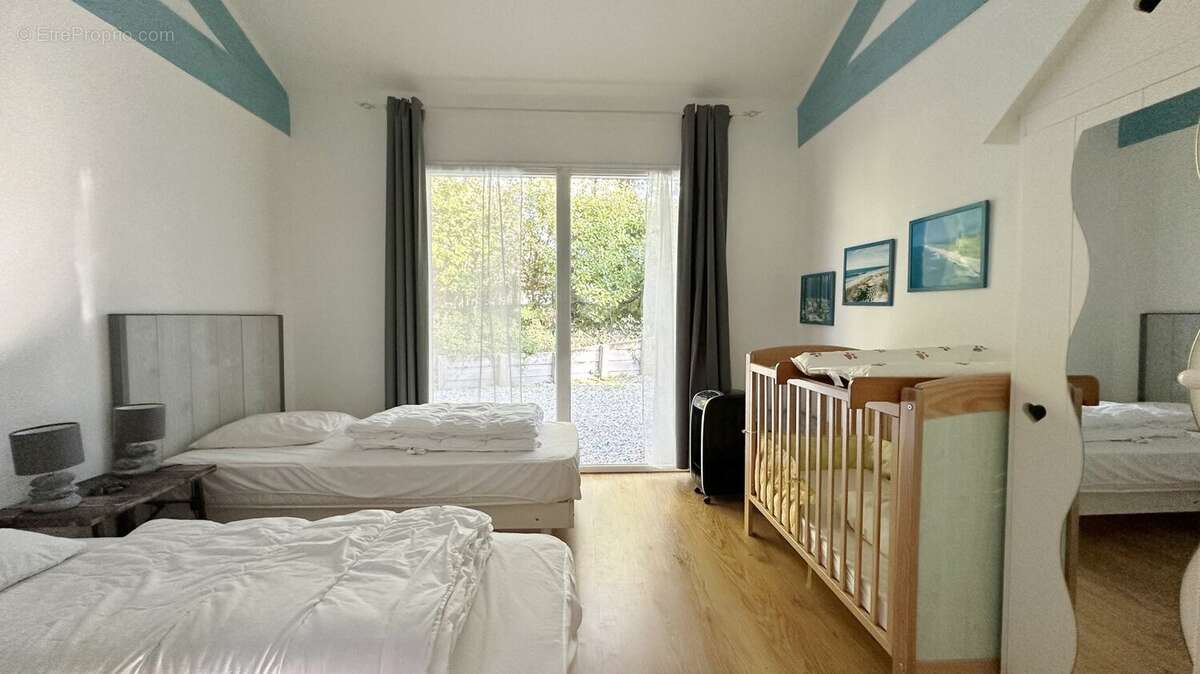 Entre Forêt Landaise et Art de Vivre  Ensemble de deux maisons sur 1638 m² de terrain boisé. - photo 11