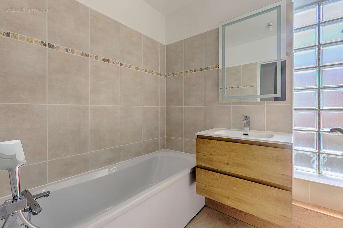 Duplex 5 pieces 118m2 avec 4 chambres et 75m2 de jardin, 2 parkings en sous-sol - photo 10