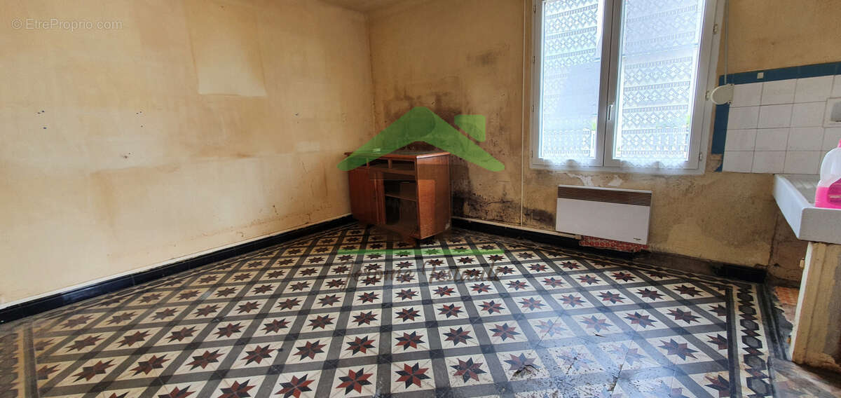 À Châteaudun, immeuble avec 2 logements 56000 € - photo 5