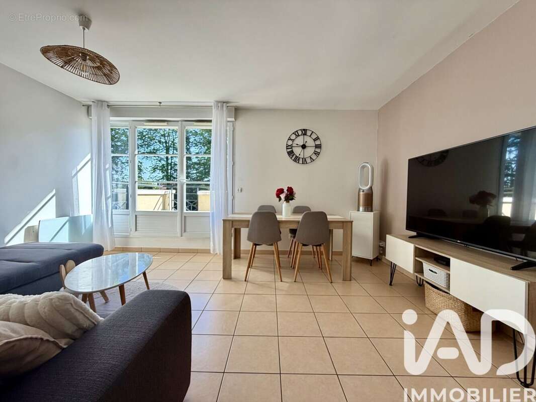 Photo 2 - Appartement à D'HUISON-LONGUEVILLE
