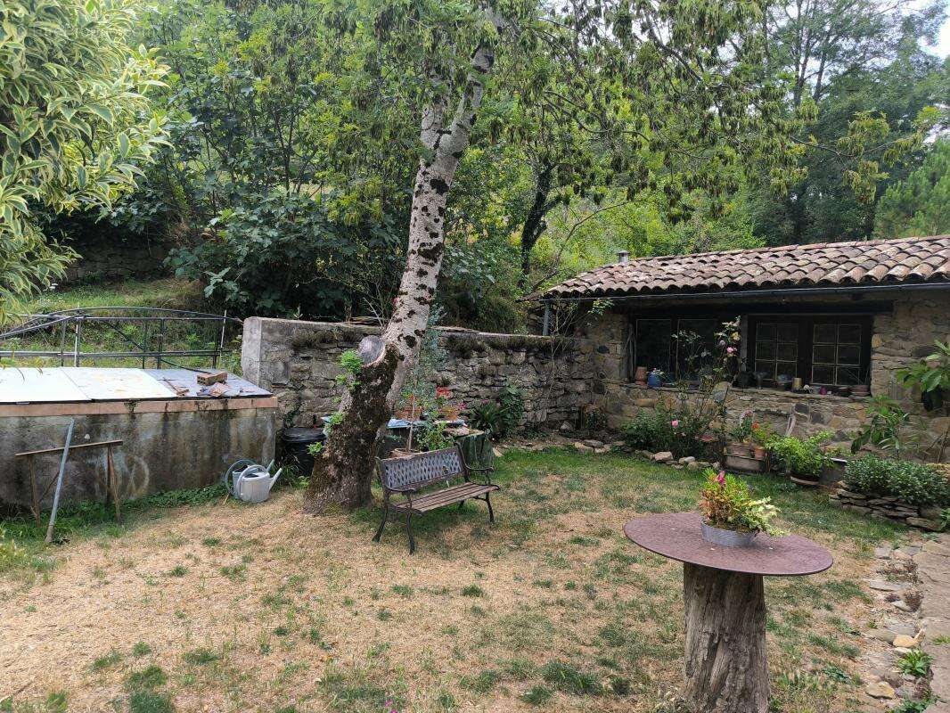 Maison en pierre  de 126 m2 terrain 5781 m2 + dependances+ gite - photo 13