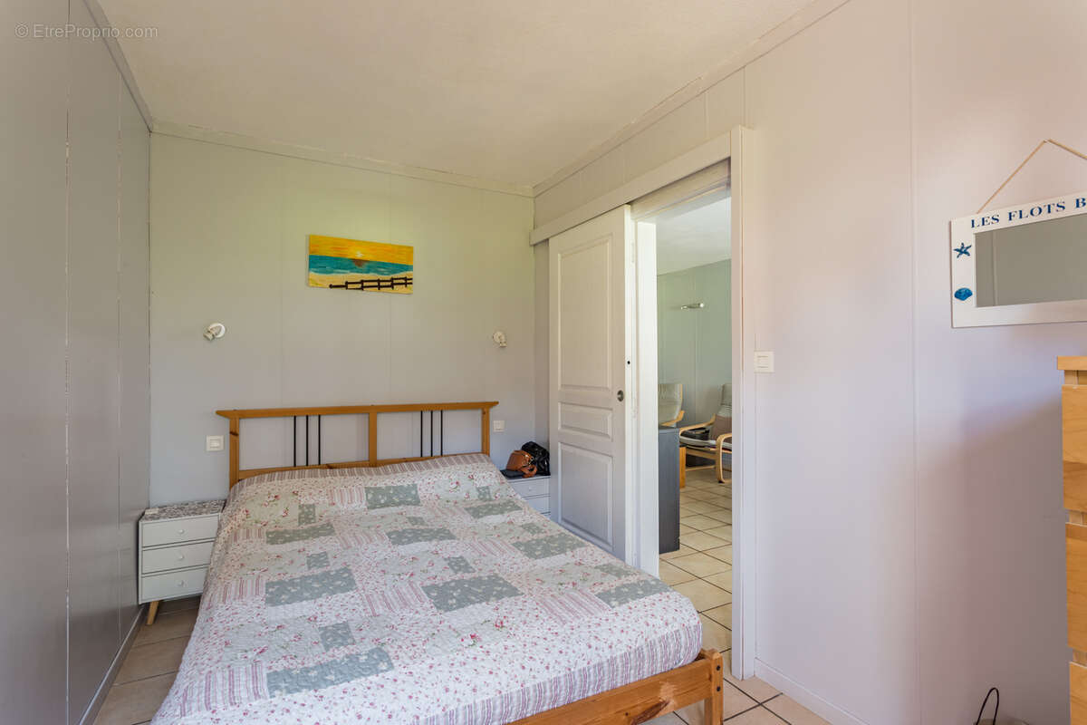 Appartement T2 bis rez-de-chaussée 52m2 + cave privative de 7m2 - photo 5