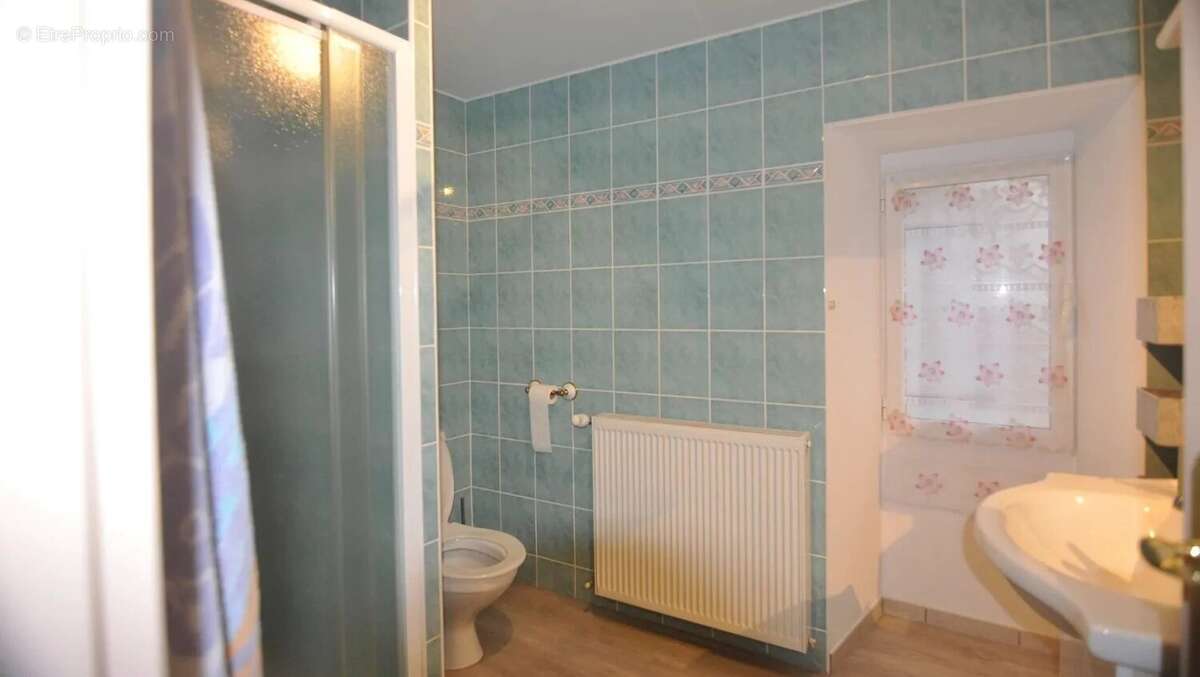 Longère   de 180 m² offrant 3 chambres avec un terrain 1410 m² - photo 9