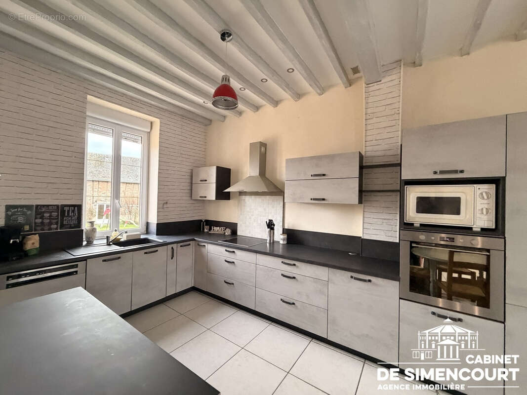 Maison à QUEVAUVILLERS