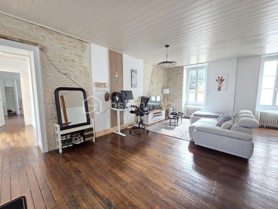Magnifique appartement T3 de 101m² avec place de parking privative et cave en hypercentre ville de Nevers - photo 6