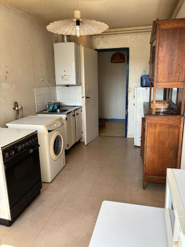 Appartement T4 de 84m2 avec grand balcon terrasse - photo 3