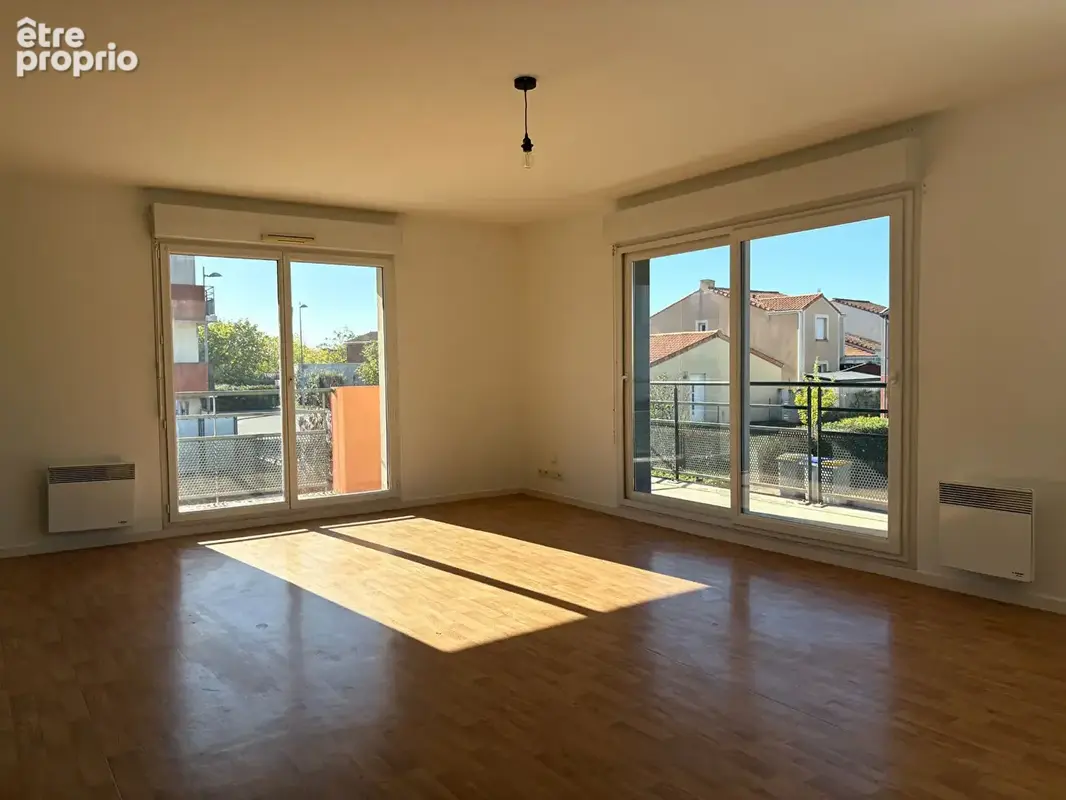 Appartement T4 de 83 m² avec balcon, garage double et cave - photo 4