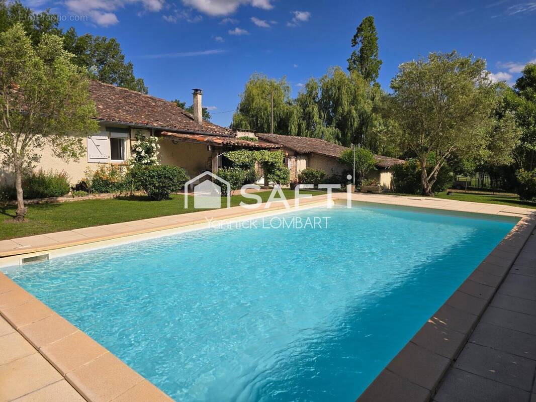Photo 1 - Maison à LA SAUZIERE-SAINT-JEAN