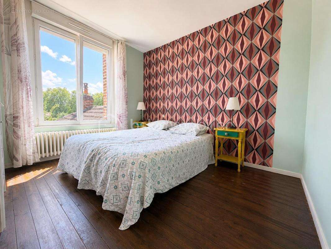 Maison familiale de 107 m² avec garage, jardin et dépendances à Saint-Quentin - photo 8