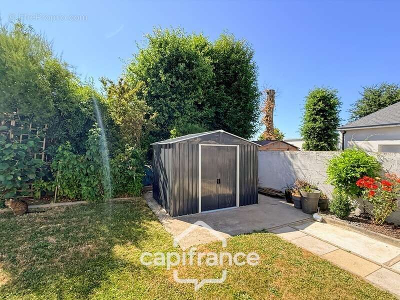 Maison contemporaine de plain-pied de 160 m² – 4 chambres – Véranda de 27 m² avec spa – Double garage – Carport – Noyal-Pontivy - photo 30