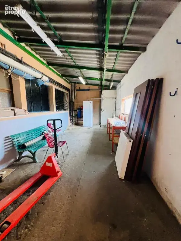 Local commercial + maison - photo 5