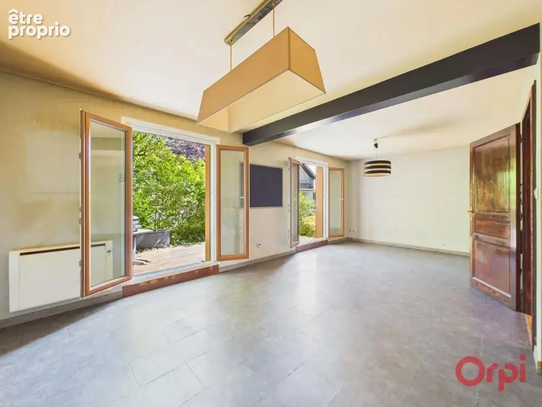 Maison familiale de 4 chambres sur terrain arboré de 480 m² - photo 4