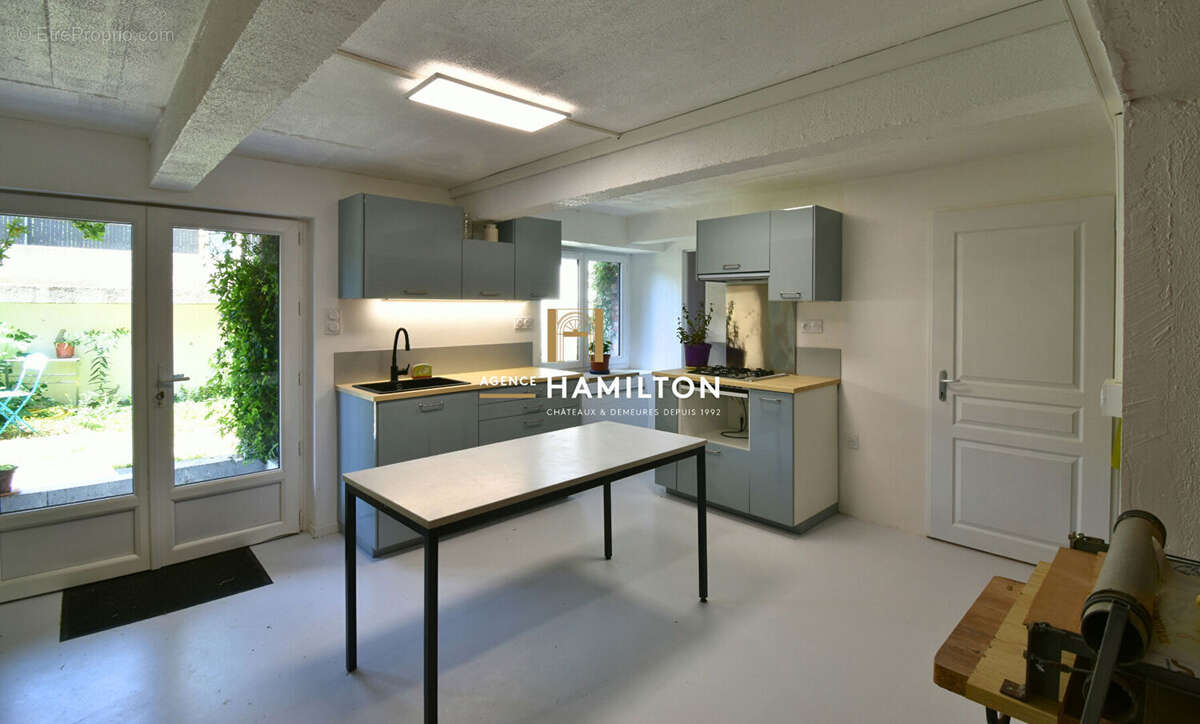 Local commercial avec logement attenant et sous-sol amenage - photo 11
